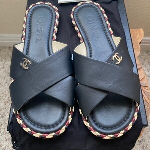 CHANEL Black Sandals with Gold Logo and Braided Trim